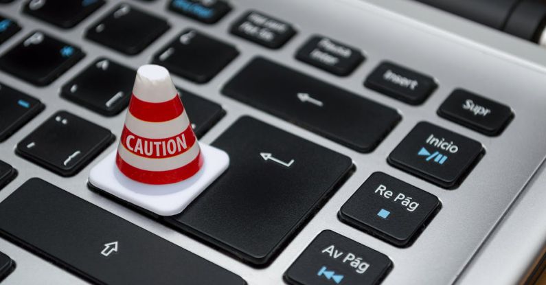 GDPR - White Caution Cone on Keyboard
