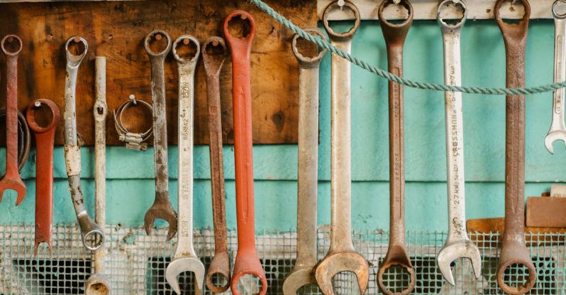 Analytics Tools - A collection of wrenches hanging on a wall