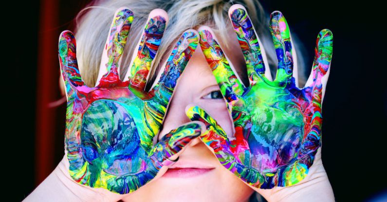 Personalization - A KId With Multicolored Hand Paint