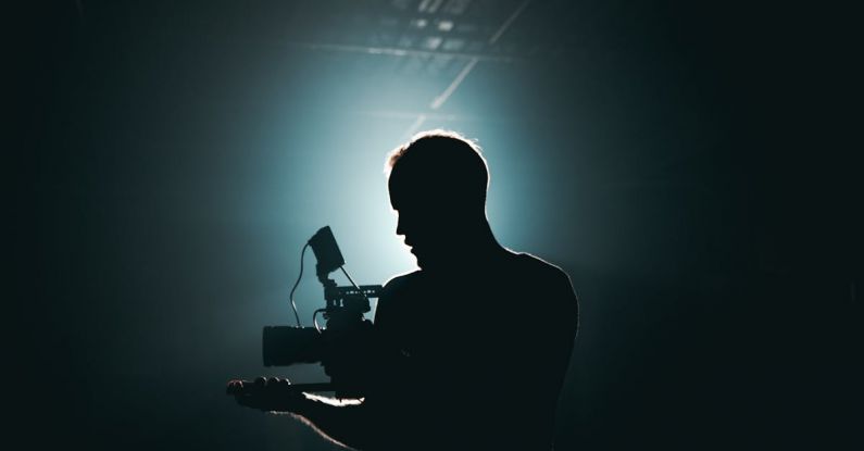 360-Degree Videos - Silhouette of Man Standing in Front of Microphone