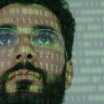 Digital Identity - Man With Binary Code Projected on His Face