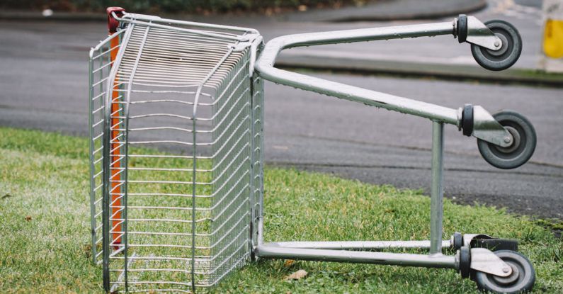 Cart Abandonment - Photo of Abandoned Shopping Cart on Grass